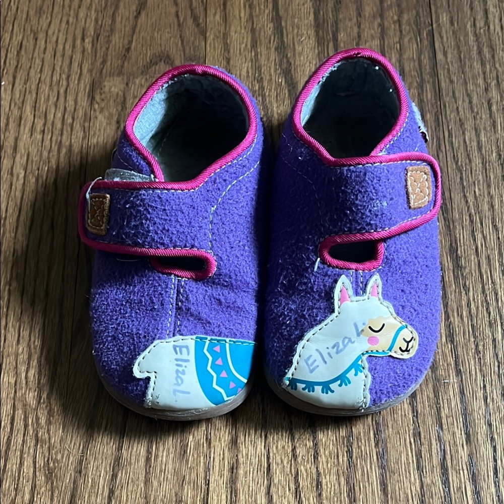 See Kai Run purple llama slippers!